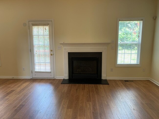 Building Photo - SPACIOUS HOME WITH DOWNSTAIRS PRIMARY BEDROOM AND BATH- LAKE WHEELER/ FARMER'S MARKET AREA