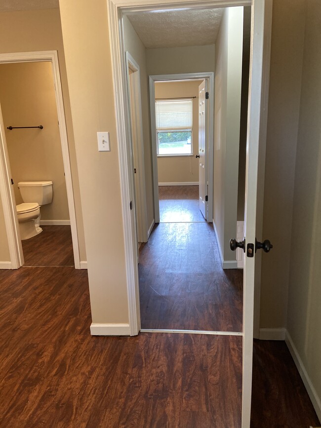 MBr looking down hallway to front BR - 110 Stonetree Drive