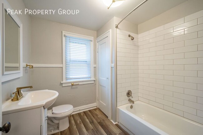 Building Photo - MOVE IN NOW! Newly Renovated Townhome! Loc...