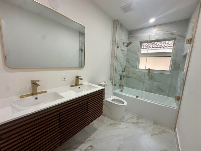 Building Photo - 10702 NW 1st Ct