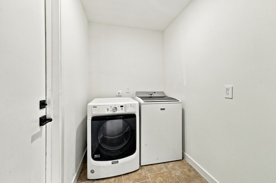Laundry room inside - 8339 Carvel Ln