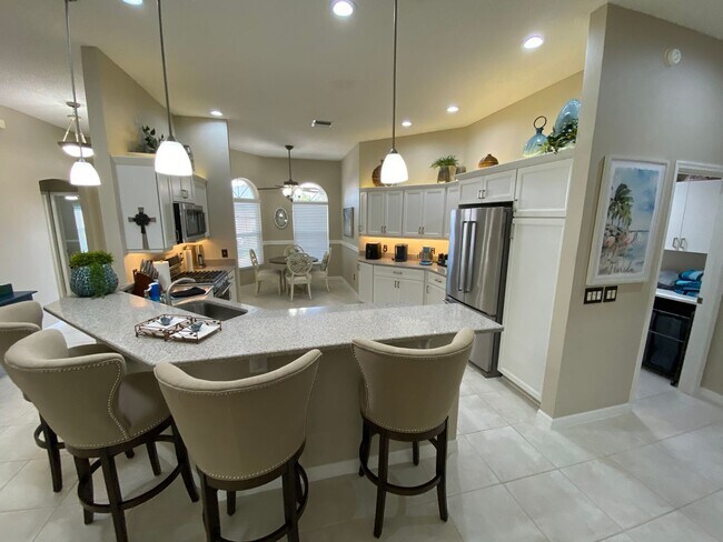 Building Photo - Gorgeous 3 + 2 Turnkey ANNUAL Lease w/Swim Spa & Large Private Screened in Patio In The Village o...