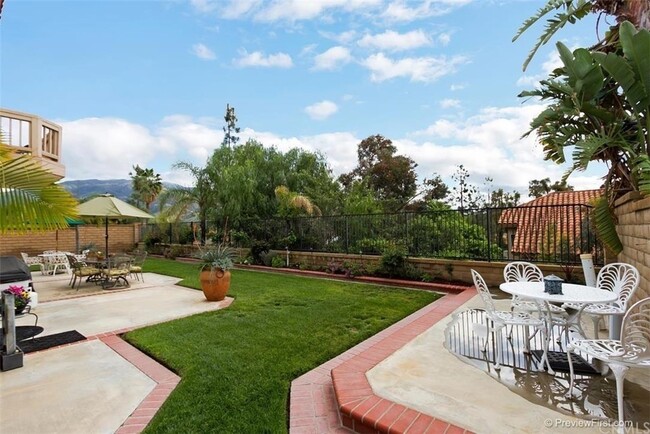 Building Photo - Executive Home in Yorba Linda features 4 b...