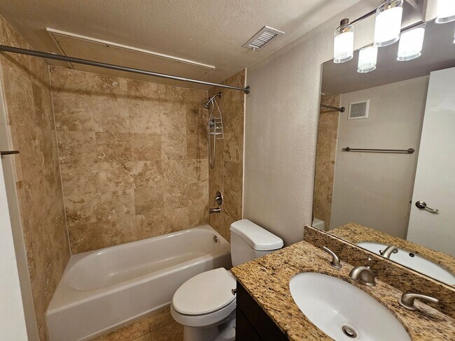 Building Photo - 2-bedroom, 2-bath condo in Gated community...