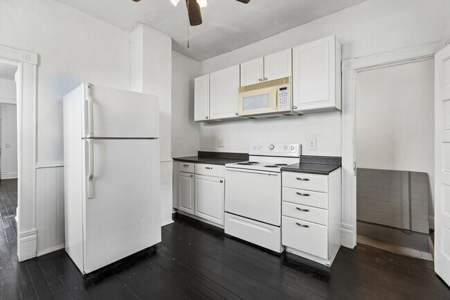 Building Photo - Next to Dog Bar!