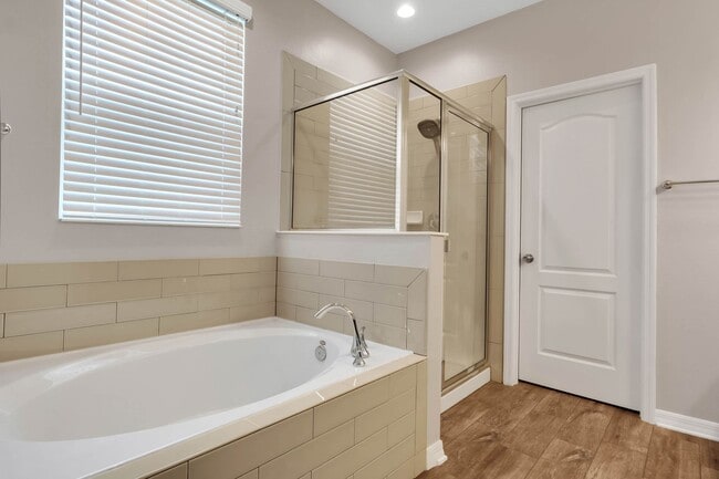 Building Photo - Spacious, Nearly New and Gated 3/2.5/2 Plu...