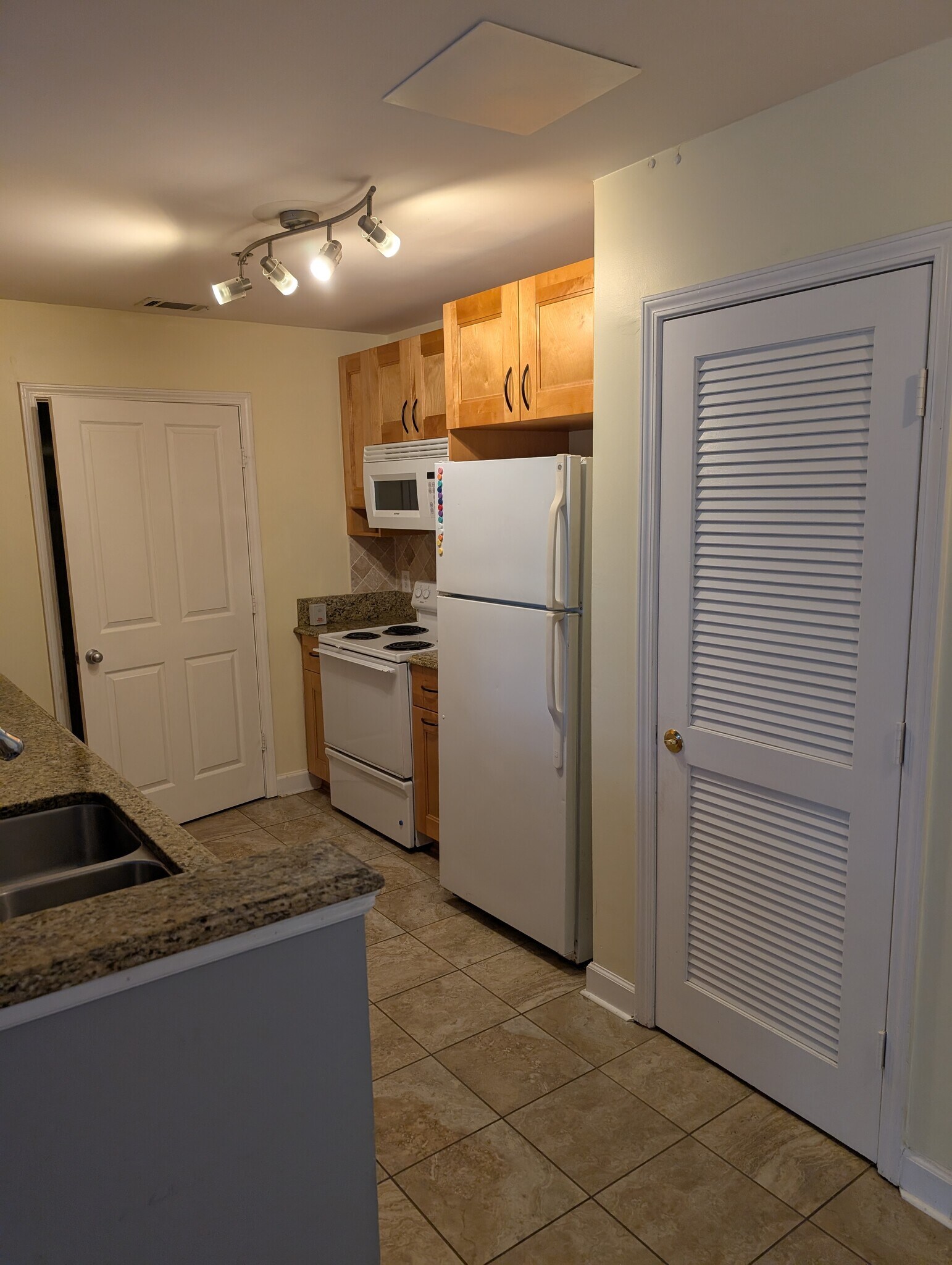 Kitchen with updated cabinetry - 1101 Juniper St NE