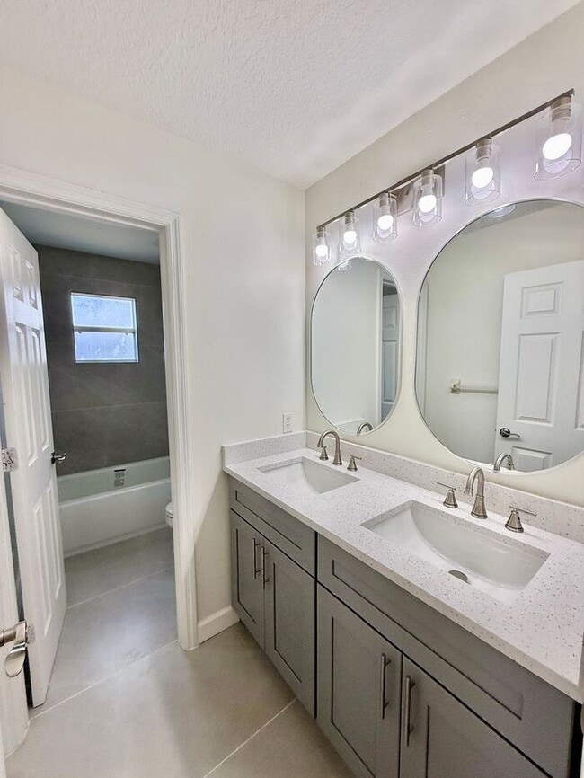 Building Photo - GORGEOUS, Large Completely Renovated Two-Story 4/2.5 PLUS LOFT in POINCIANA VILLAGES!