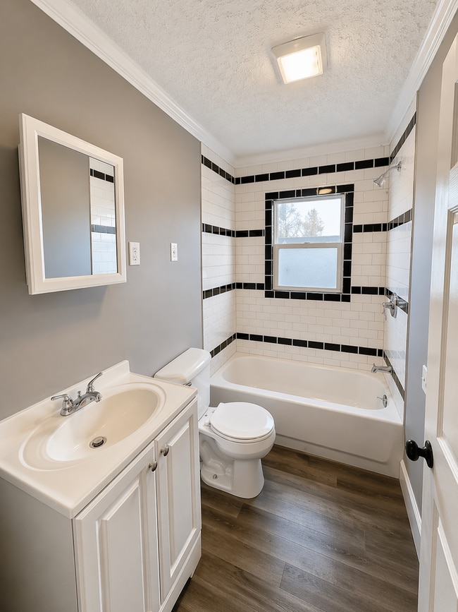 Building Photo - Updated 2BR Home with Finished Basement and 2-Car Garage