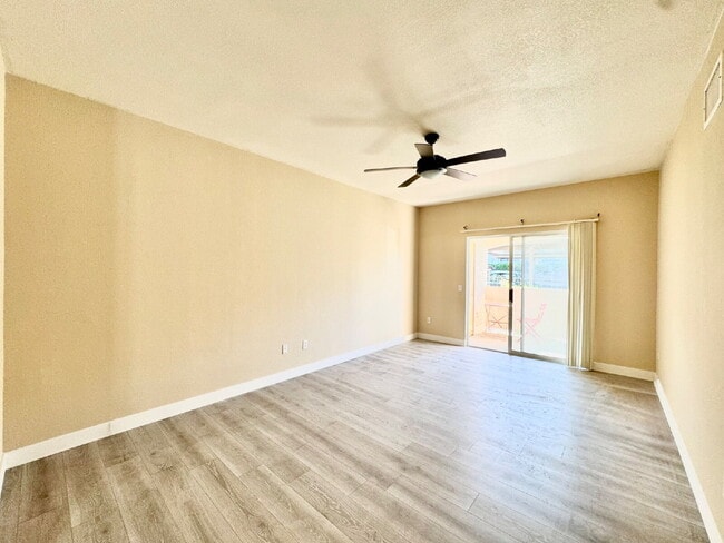 Building Photo - DOWNSTAIRS CONDO | GATED COMMUNITY | CENTENNIAL HILLS | UPDATED 3 BEDROOM