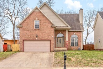 Building Photo - Pet Friendly Three Bedroom with Bonus!