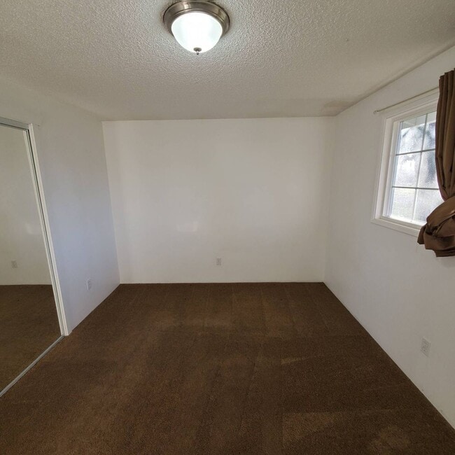 Building Photo - Cozy 2 Bed, 1 Bath duplex with large yard - Won't Last Long!