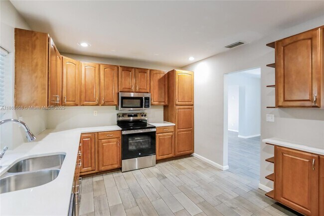 Building Photo - 2480 NW 63rd Ave