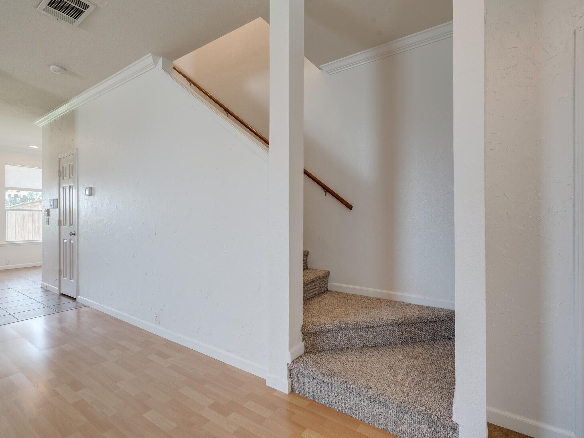 Half Bathroom and staircase - 10528 Astor Dr