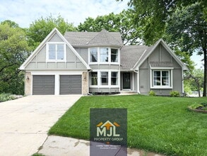 Building Photo - Executive 5 BR Cul-de-Saq Home In Blue Valley Schools | Private Wooded View | Finished Walkout Ba...