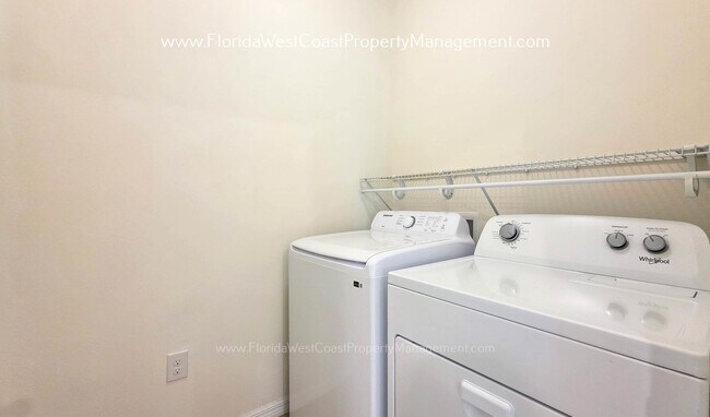 Building Photo - MOVE IN READY ! 4 BEDROOM/2 BATH! TILE- LVP THROUGHOUT! LAWN MOWING INCLUDED!