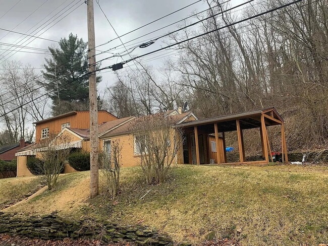 Building Photo - Introducing this attractively updated 4-bedroom, 1-bath home on Poketa Rd.