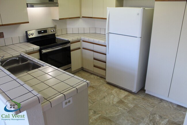 Building Photo - $2,895 - Upstairs 2 Bedroom/1 Bath Condo