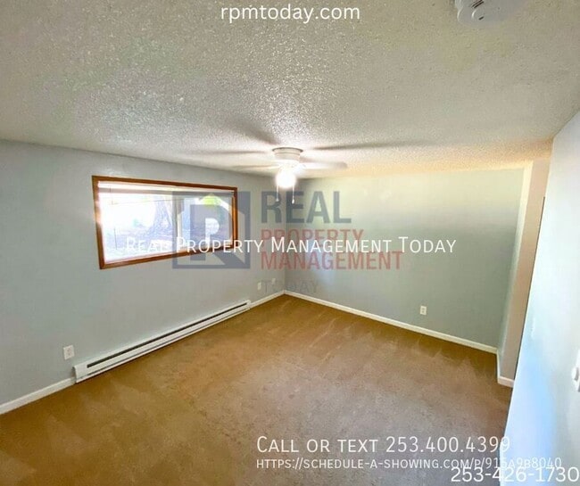 Building Photo - 8220 143rd St Ct NW