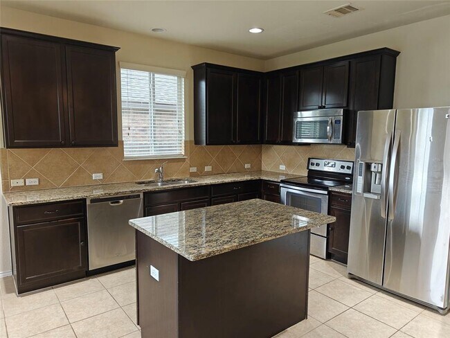 Building Photo - 5610 Hopkins Dr