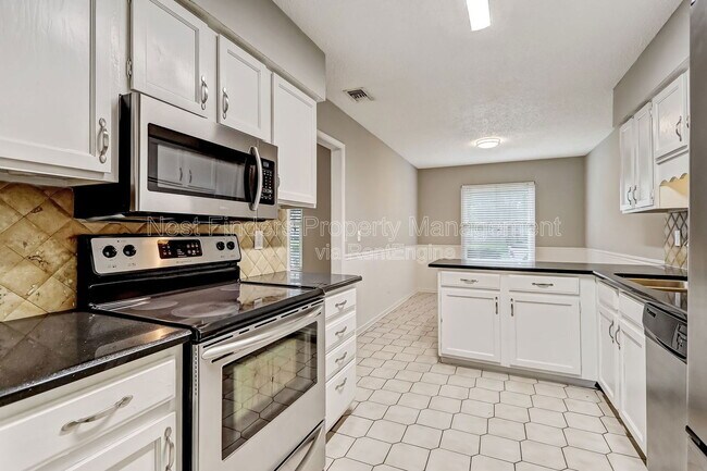 Building Photo - 10855 Mandarin Station Dr W