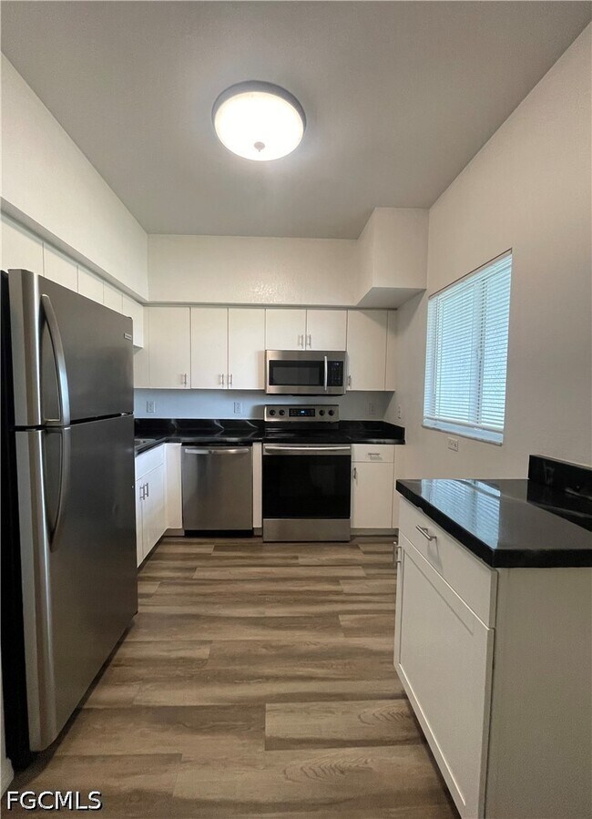 Building Photo - 8555 Bernwood Cove Loop