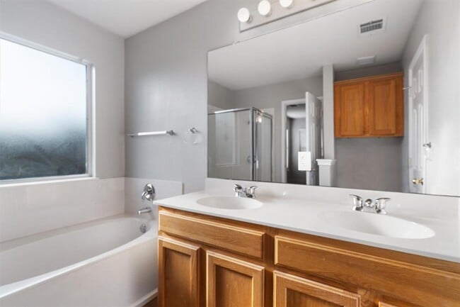 Building Photo - 14508 Spearmint Tea Trail