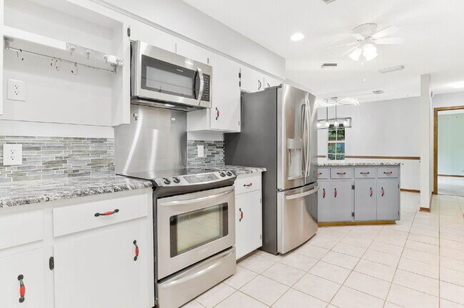 Building Photo - AVAILABLE NOW – $3,000/MONTH – ALL UTILITIES + LAWN SERVICE + POOL SERVICE INCLUDED!