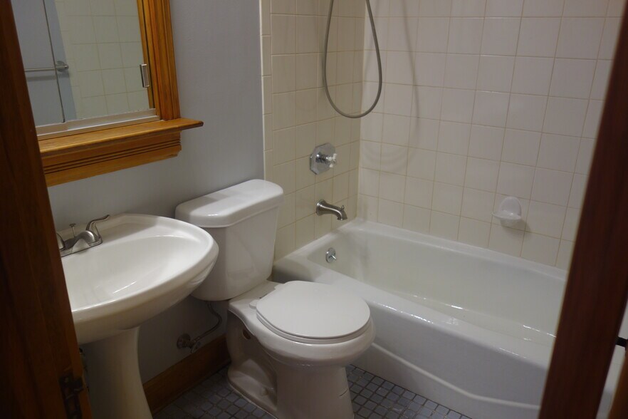 Full bathroom with built in medicine cabinet. - 216 Kentucky