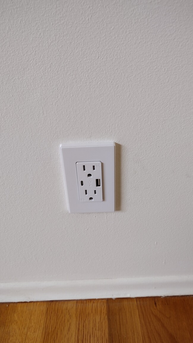 each bedroom has an upgraded modern electrical outlet with USB for charging - 23204 64th Ave W