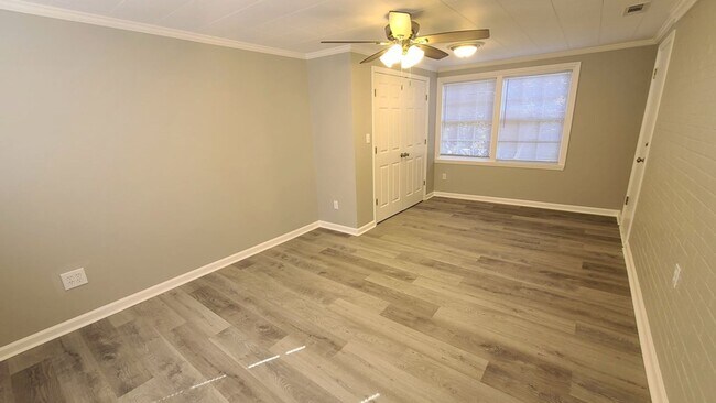 Building Photo - Modern Charm: Spacious 4-Bedroom Home with Inviting Amenities in Valdosta, GA