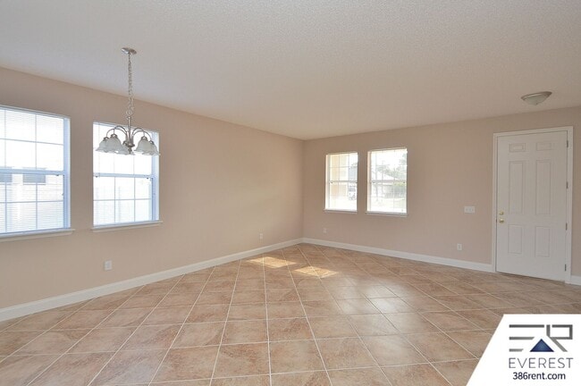 Building Photo - SPACIOUS, FULLY FENCED 4/2.5/2 IN DESIRABLE MATANZAS WOODS