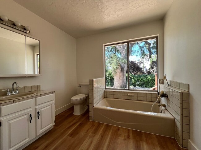 Building Photo - Two Bedroom Two Bathroom in a Parklike Set...