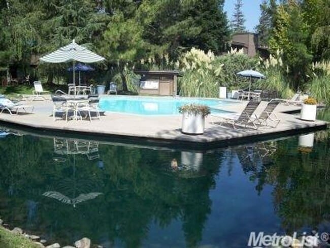 Building Photo - Lower-Level Condo in Gated Timberlake, The...