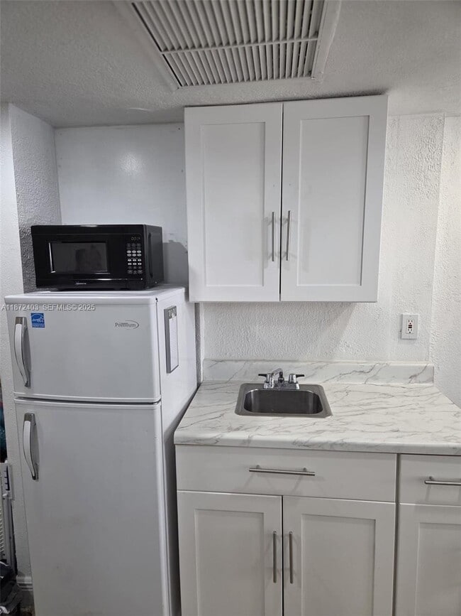 Building Photo - 19201 Collins Ave