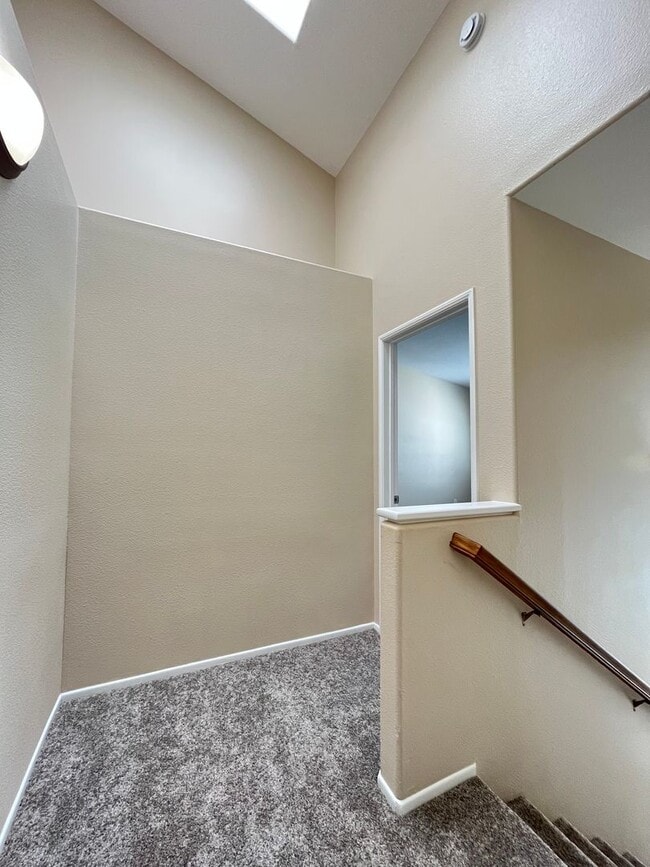 Building Photo - PICTURE PERFECT!  3 BR/3 BA END UNIT CONDO with DIRECT ACCESS 2 CAR GARAGE