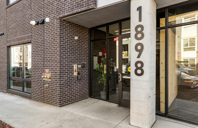 Building Photo - Improved Price!!!! Bustling Location! Mode...