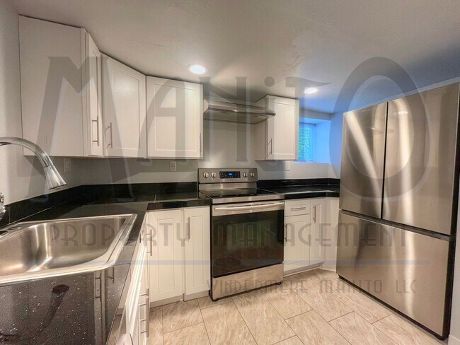 Building Photo - Garland Triplex