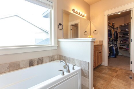 Master bathroom/closet - 2014 E Mountain Man Dr