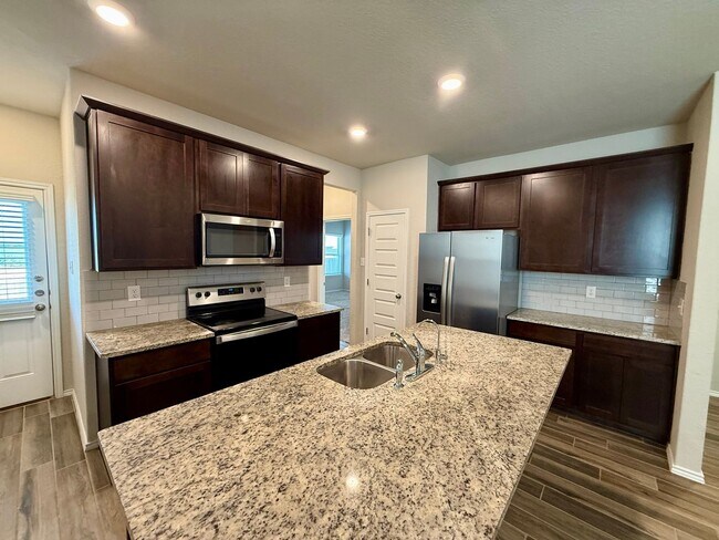 Building Photo - Lovely 1-story 4 bedroom/2 bath home is an...