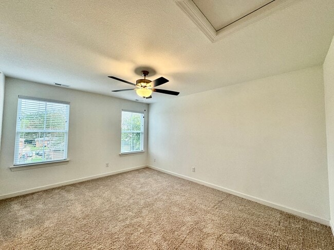 Building Photo - Practically New & Available NOW! Americana Luxury Townhomes! Pet Friendly! Attached Garage! All A...