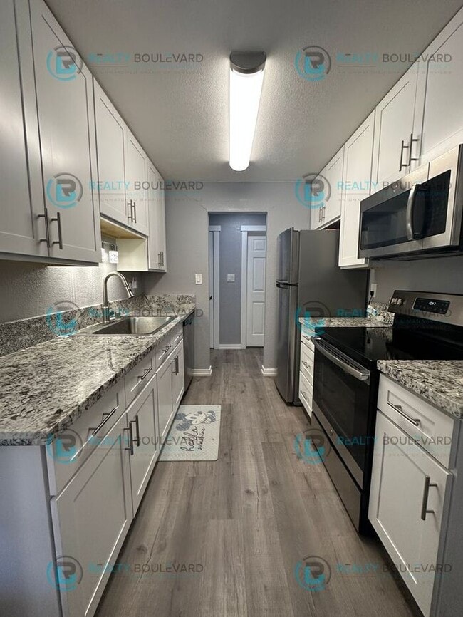 Building Photo - 1/2 Month Free! Relax, Entertain, Repeat – The Perfect 2-Bedroom Apartment