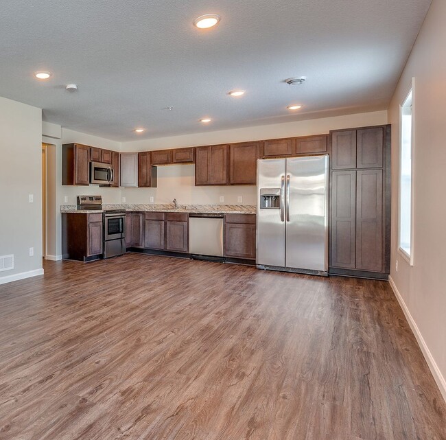 Building Photo - FOR RENT avail April 01: 3bd2ba2car garage END UNIT modern townhome