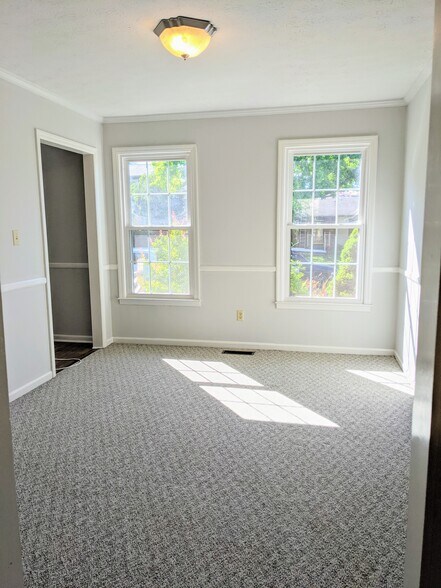 Front left room as viewed from kitchen, perfect for home office, - 3221 Hunters Point Dr
