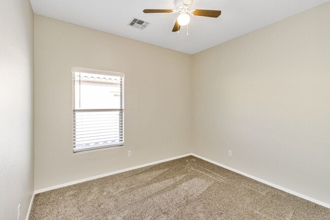 Building Photo - Bright Open Living & a Patio Perfect for Relaxing!