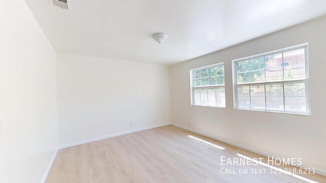 Building Photo - 9802 E Camino Real Ave