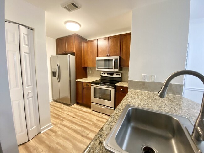 Building Photo - First Floor, Two Bedroom, Two Bathroom updated Condo!