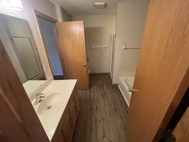 Building Photo - Spacious 3BR/1.5BA Townhome with Attached ...