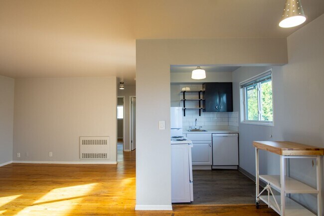 Building Photo - ONE MONTH FREE! Renovated Mid-Century 2Bdr w/Hardwoods, Dishwasher + Pets OK