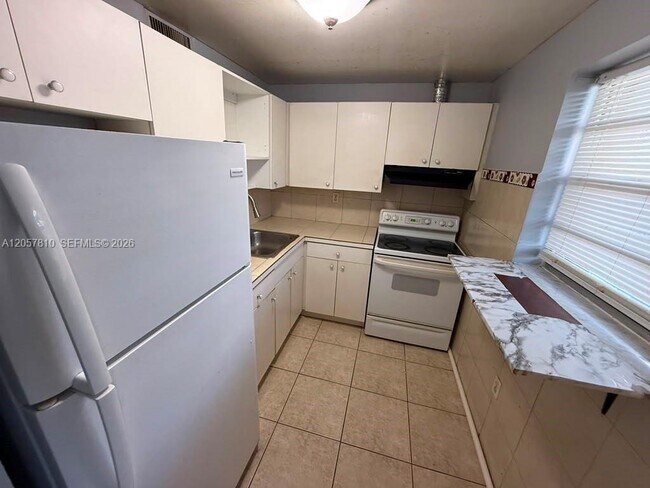 Building Photo - 6095 W 18th Ave